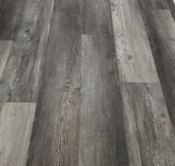 Luxury vinyl tile flooring in gray and brown tones